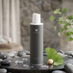 LIISSE Purifying Toner refreshing mist application on cotton pad
